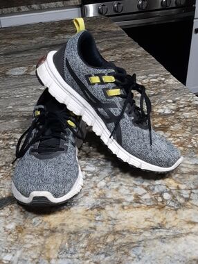Women's Grey Asics Athletic Running Shoes with Yellow Accents Sz 9